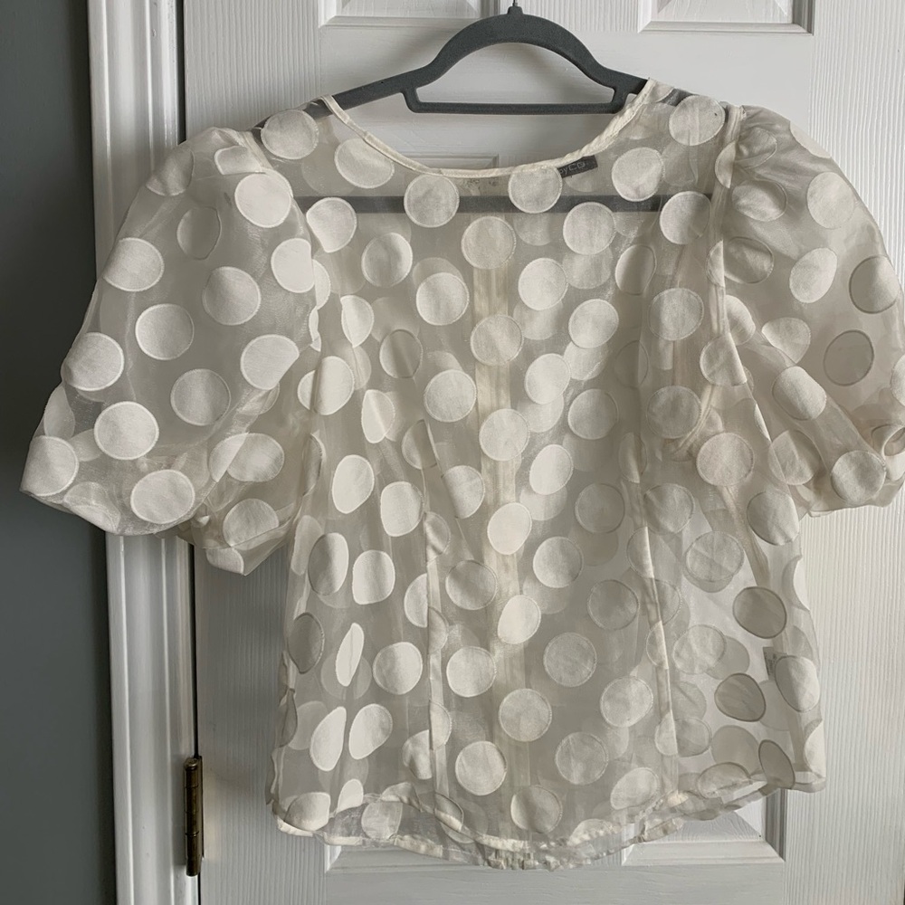 Puffy sleeves off white, cream shirt shirt.